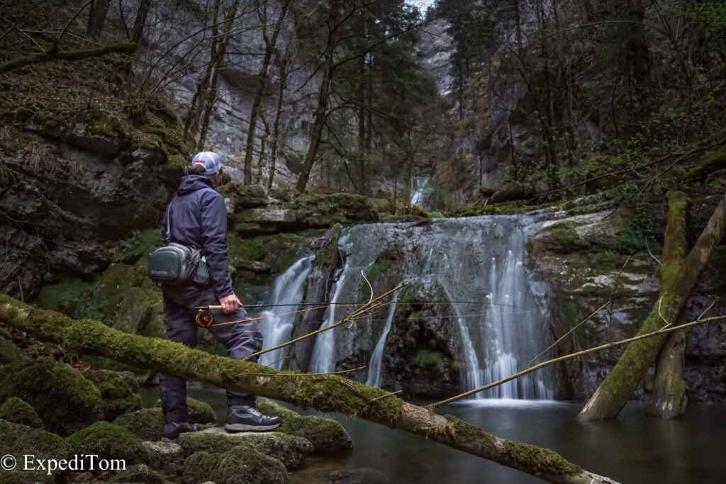 Fly Fishing in Switzerland ExpediTom Swiss alps outdoor waterfall dark
