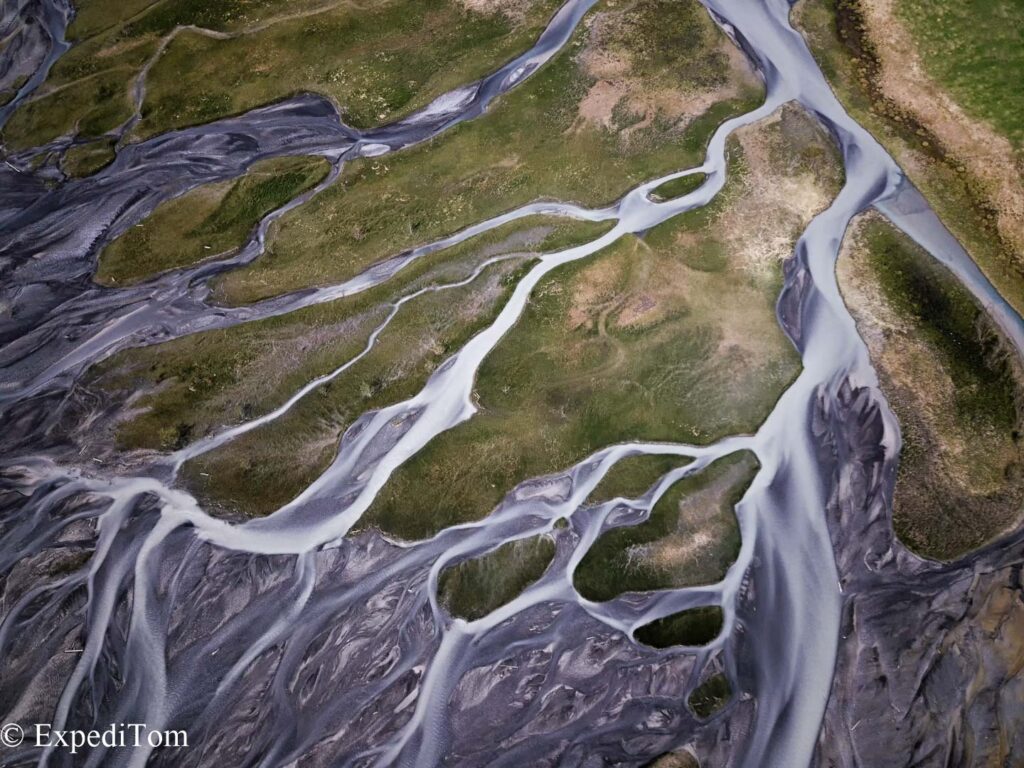 Birds view on the meandering creeks in the Bernese Alps in Switzerland Birds view on the meandering creeks in the Bernese Alps in Switzerland